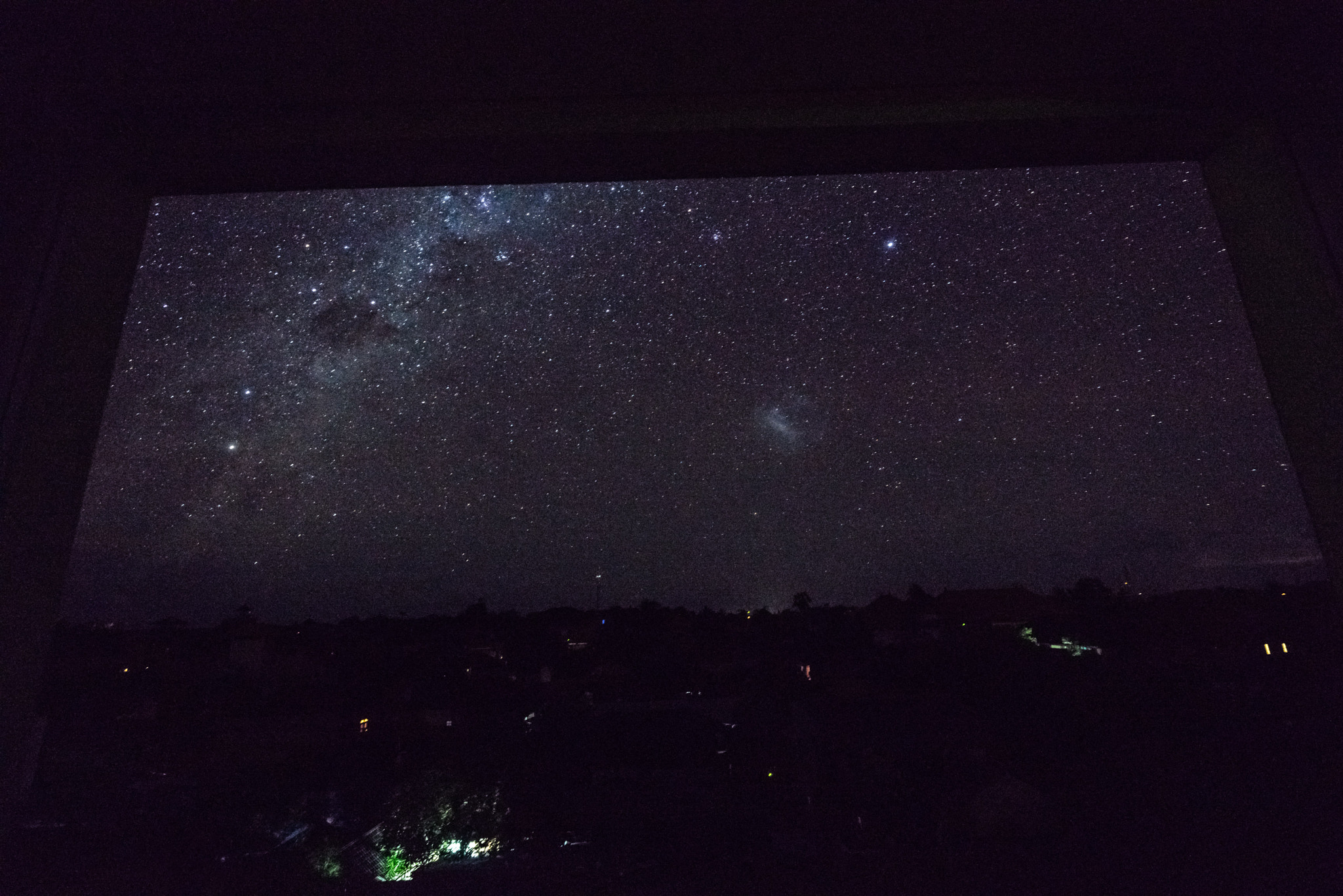 Sony a7R + Sony Vario-Tessar T* FE 16-35mm F4 ZA OSS sample photo. Starscape from middle of denpassar in bali photography
