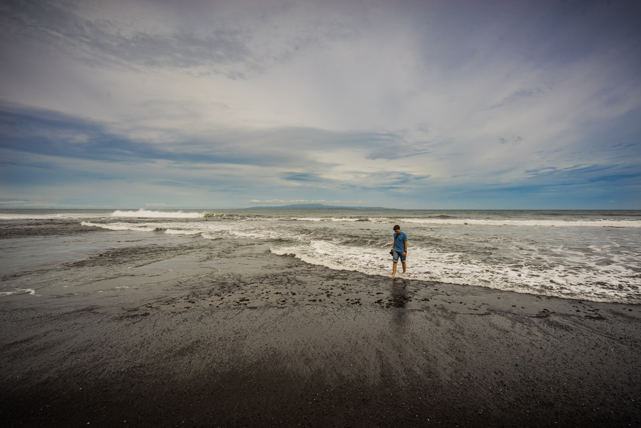 Sony a7R + Sony Vario-Tessar T* FE 16-35mm F4 ZA OSS sample photo. Black beach outside of komune beach club photography