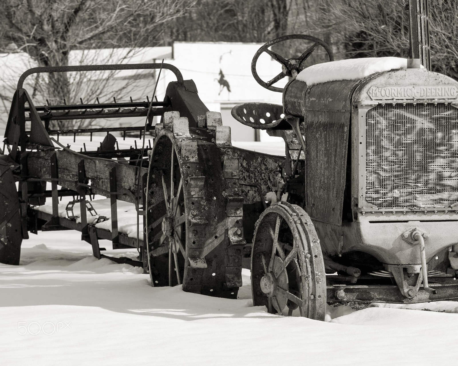 Canon EF-S 55-250mm F4-5.6 IS sample photo. Tractor in the snow photography