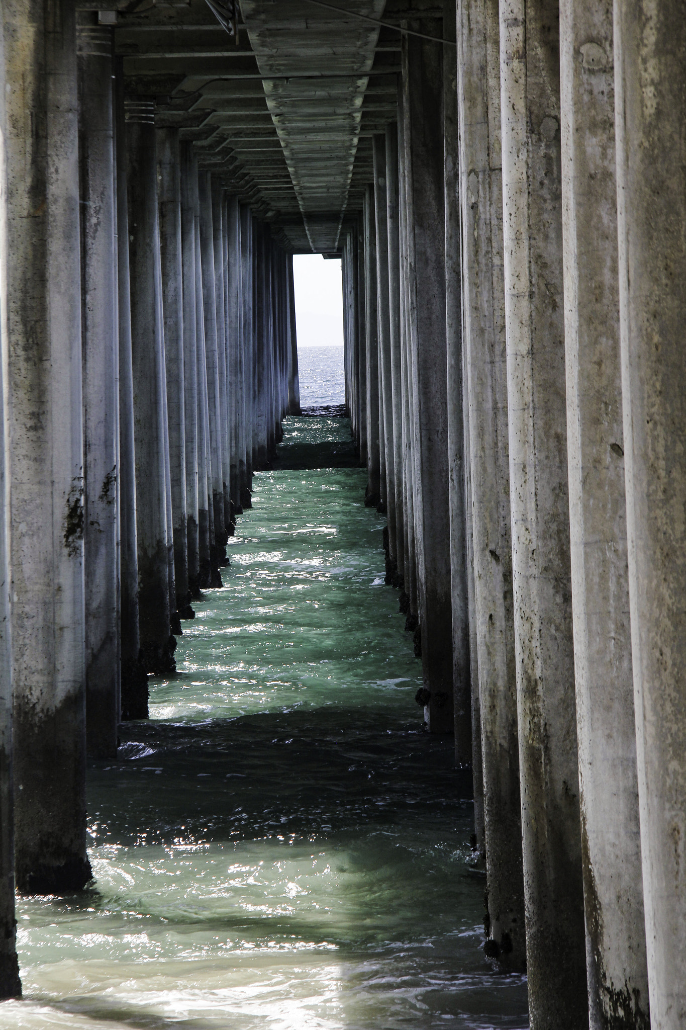 Canon EF-S 18-200mm F3.5-5.6 IS sample photo. Under the pier photography