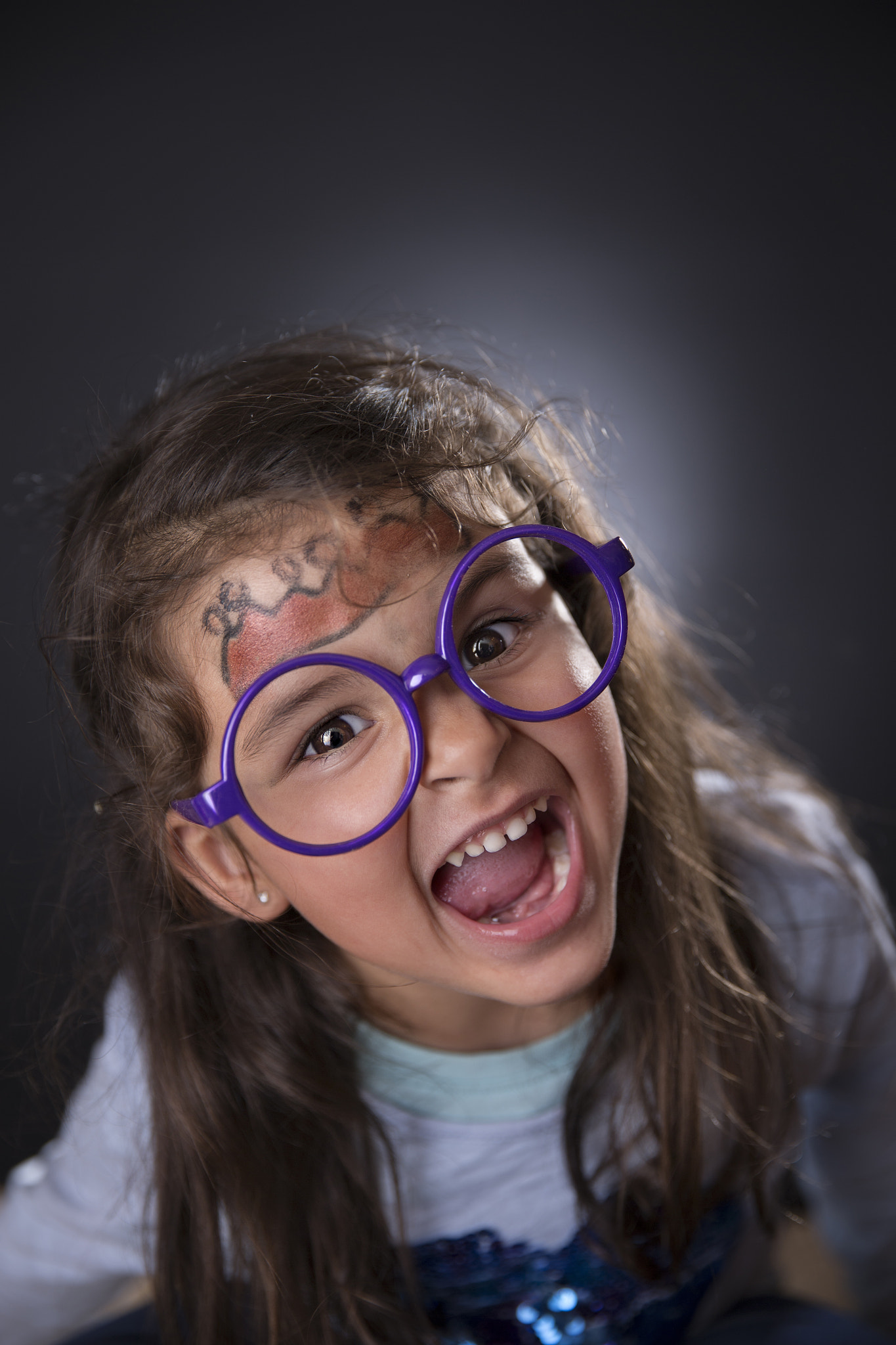 Canon EF 24-70mm F2.8L II USM sample photo. Funny four years girl making faces photography