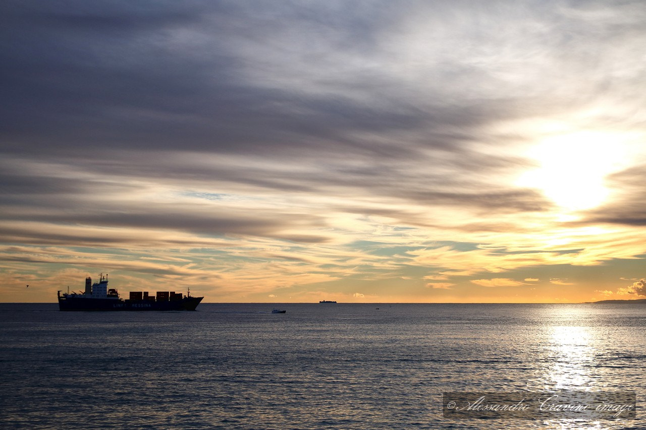 Canon EF-S 18-55mm F3.5-5.6 IS sample photo. Ship and sunset photography