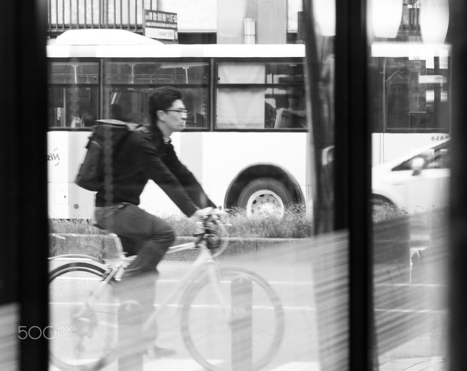 Canon EF-S 55-250mm F4-5.6 IS sample photo. Man on bike photography