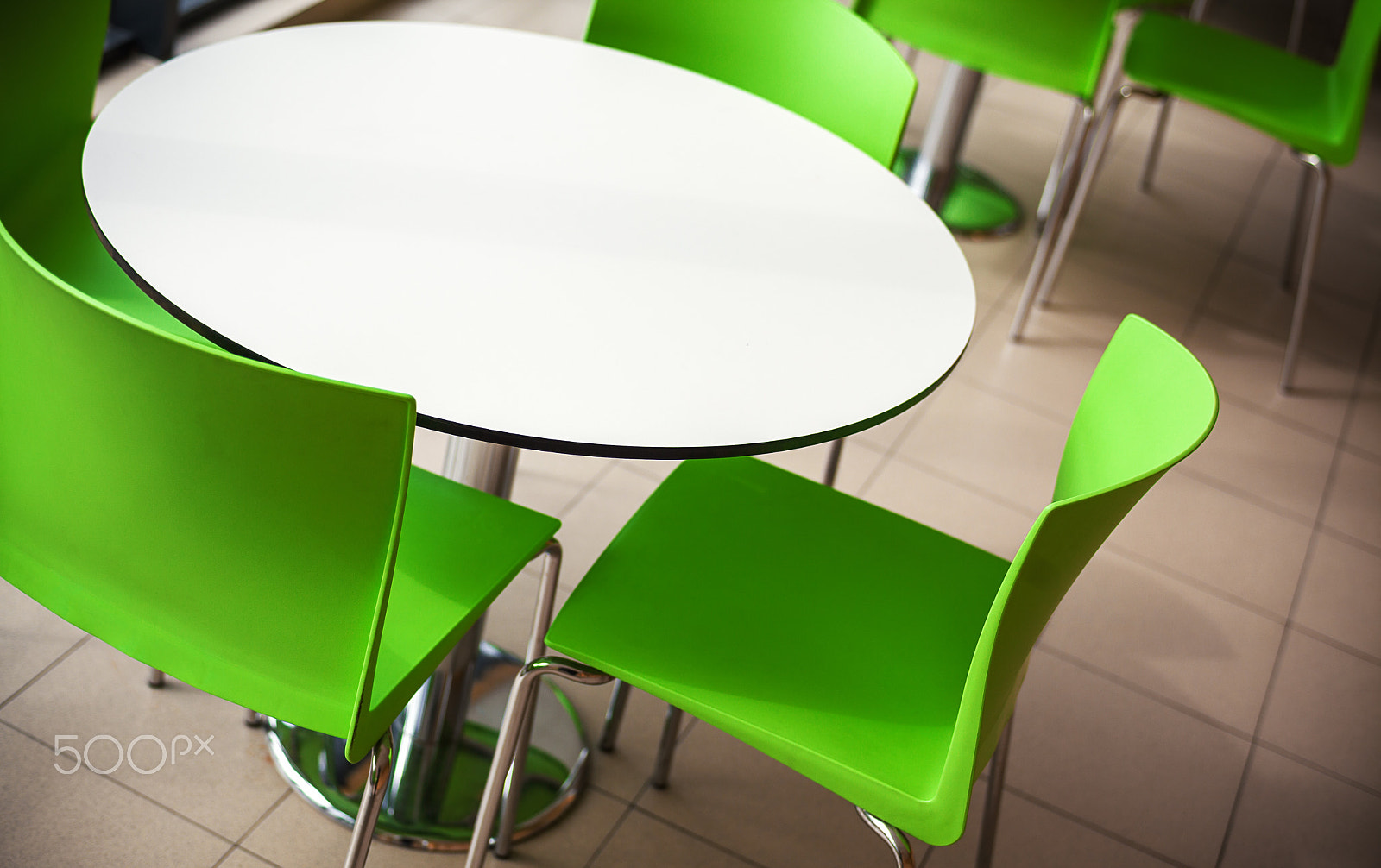 Canon EF 35-80mm f/4-5.6 sample photo. Tables and chairs of a restaurant photography