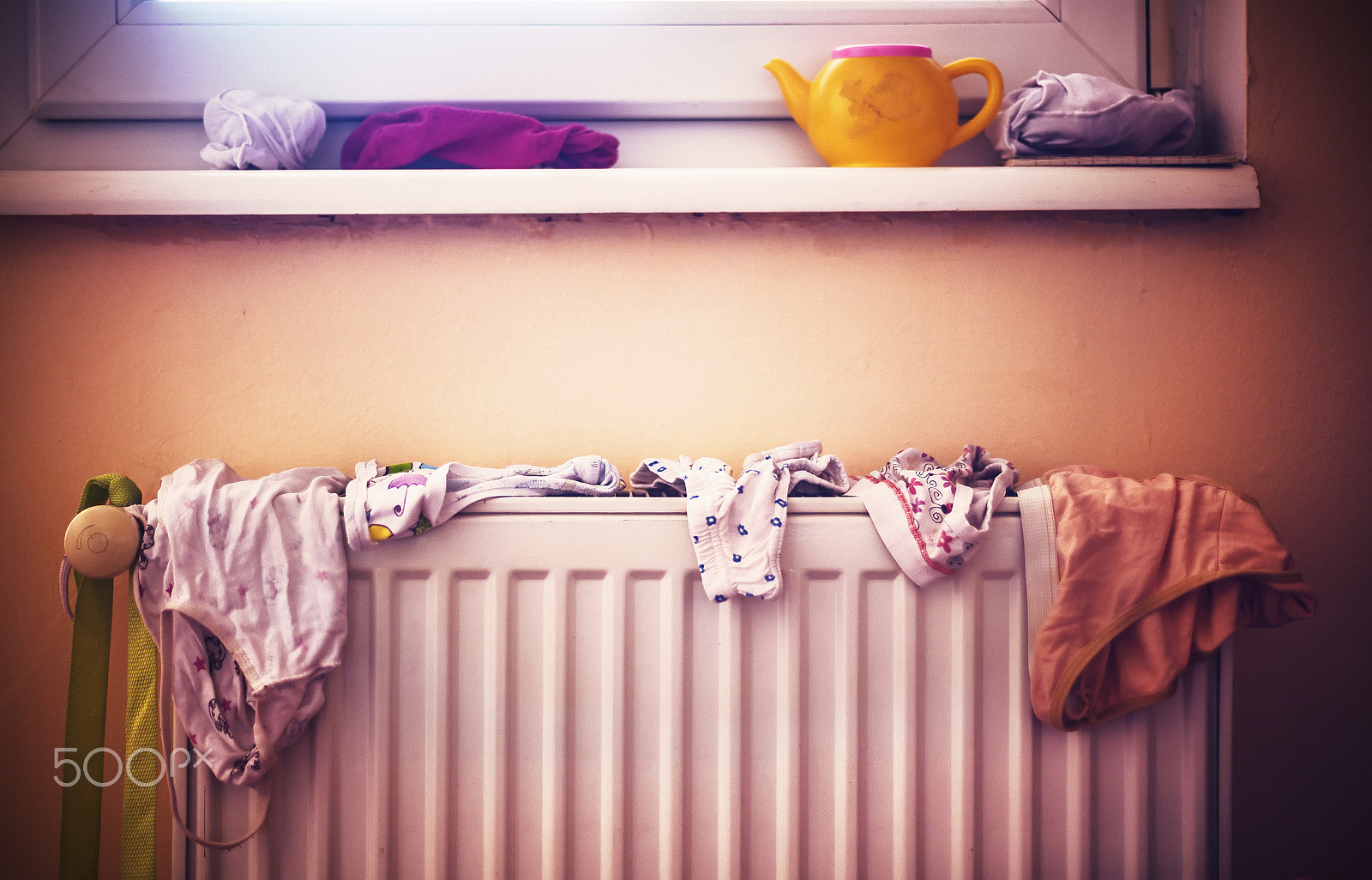Canon EF 35-80mm f/4-5.6 sample photo. Children's underwear on radiator photography