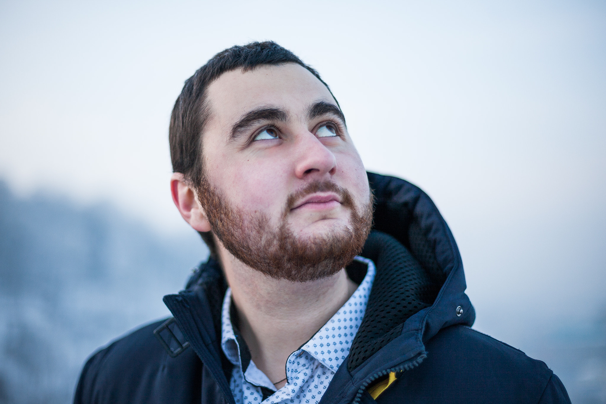 Canon EOS 5D sample photo. Portrait of a young dreaming happy man looking up at blue sky photography