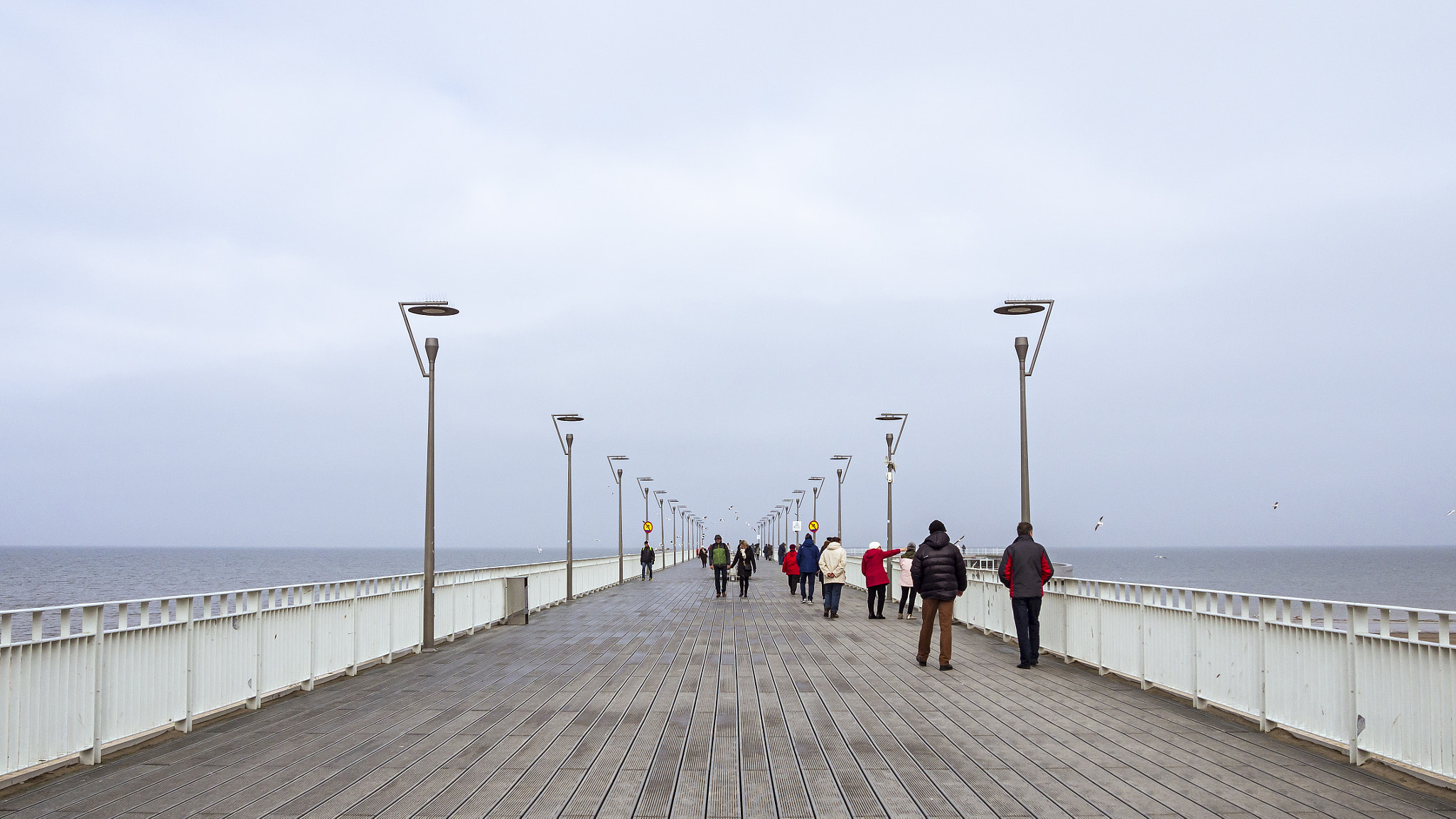 Olympus PEN E-PL5 sample photo. People on a pier photography