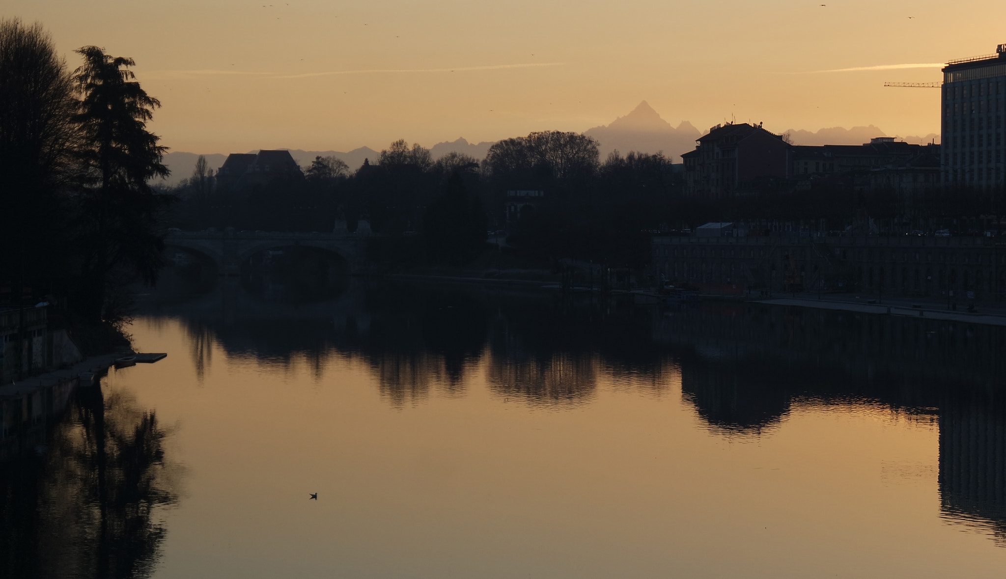 Samsung NX 16-50mm F3.5-5.6 Power Zoom ED OIS sample photo. Orange and black city photography