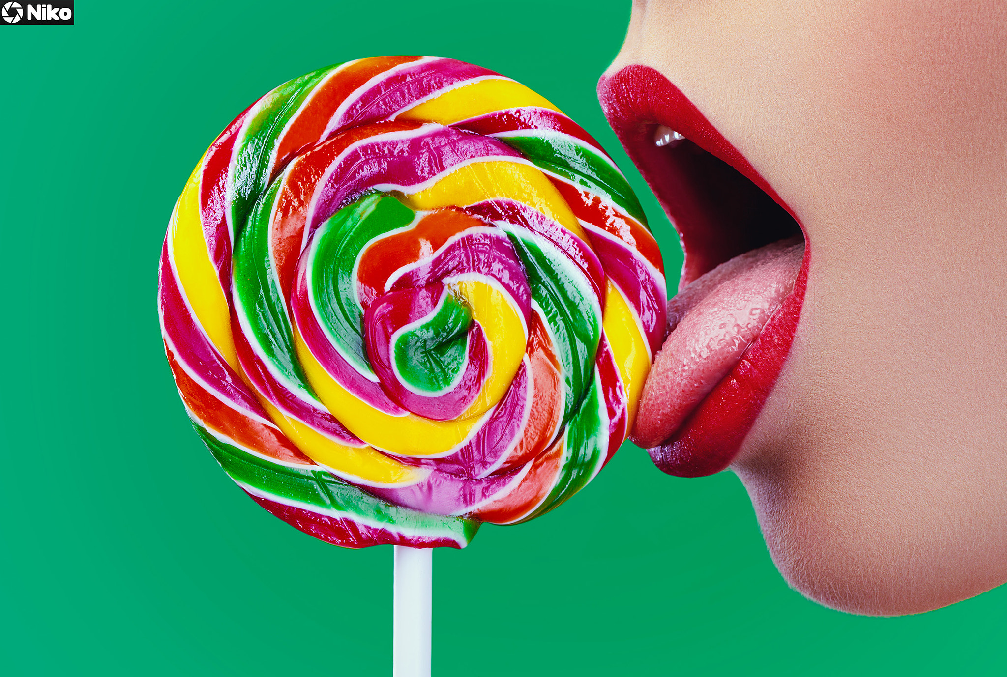 Canon EF 100mm F2.8L Macro IS USM sample photo. Girl licking big colored lollipop photography