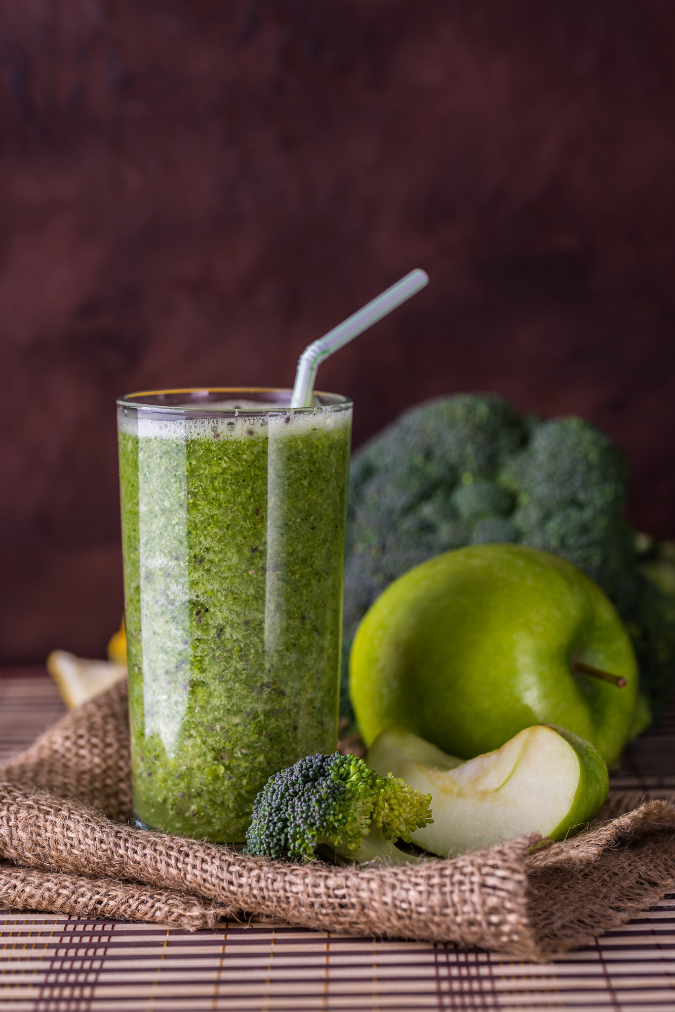 Nikon D610 + Tamron SP 90mm F2.8 Di VC USD 1:1 Macro (F004) sample photo. Broccoli smoothie in glass bowl on wooden background with lemon photography