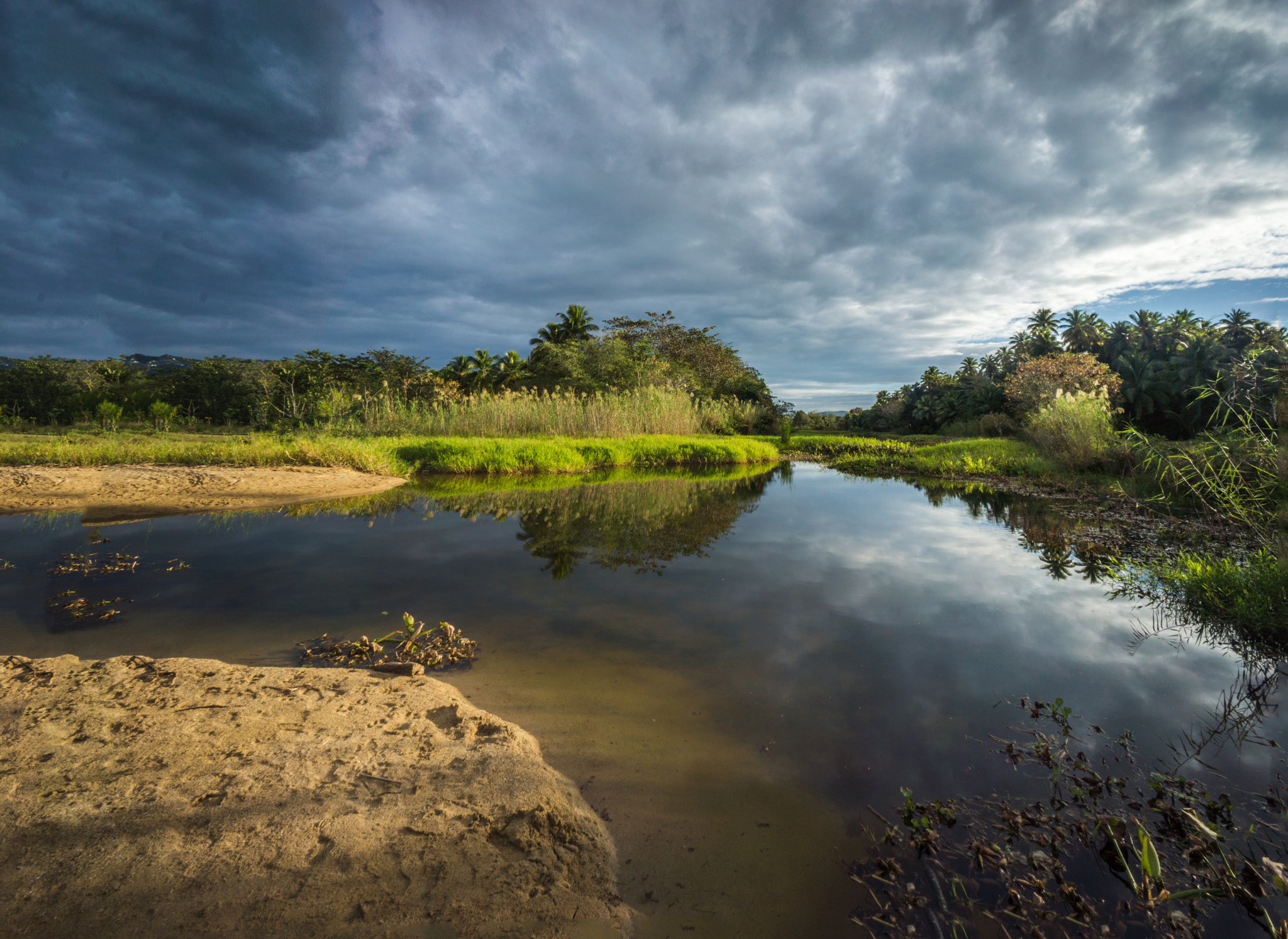 Sony Alpha NEX-7 + Sony E 16mm F2.8 sample photo. Sunrise-lagoon at tres hermanos beach, rincon, puerto rico photography