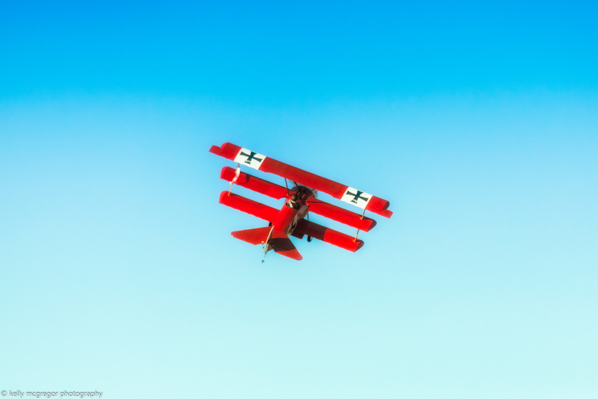 Canon EOS 50D + Canon EF 100-400mm F4.5-5.6L IS II USM sample photo. Red baron in flight  photography