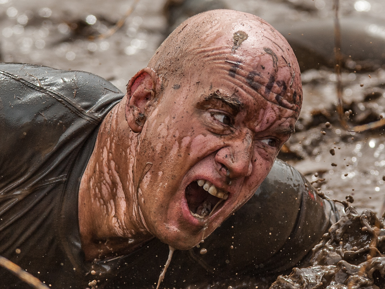 Nikon D700 sample photo. Tough mudder pain photography