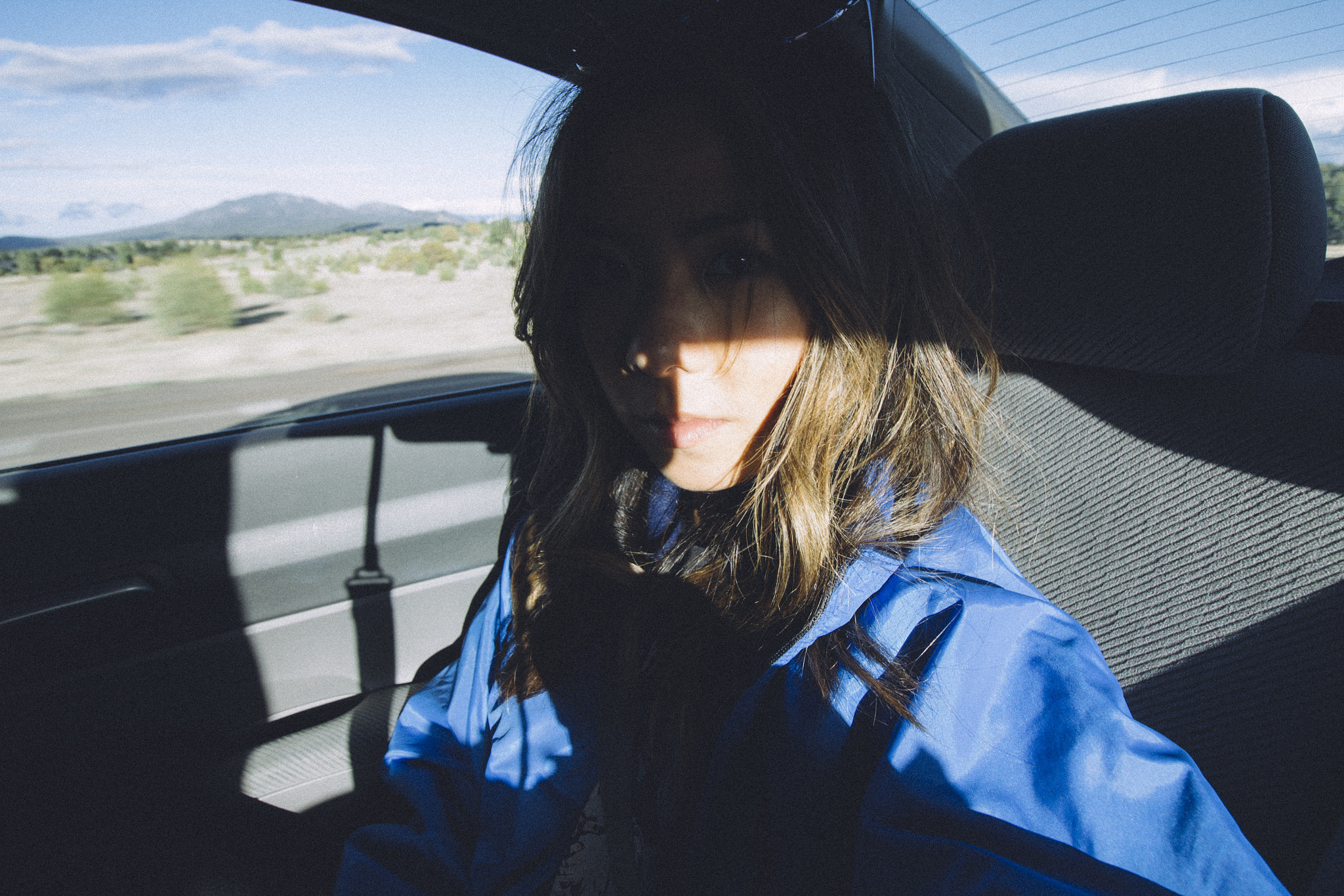 Canon EOS 60D sample photo. A selfie self portrait in the backseat of a car photography