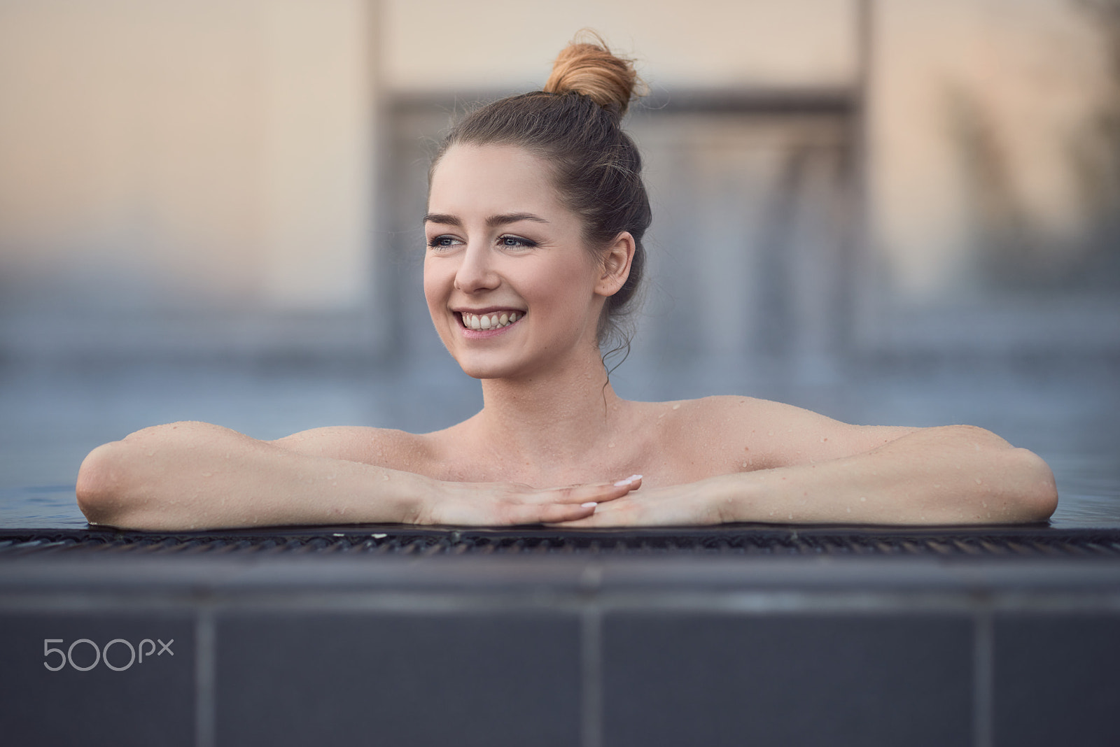 Nikon D800 + Nikon AF-S Nikkor 85mm F1.8G sample photo. Happy young woman enjoying a relaxing swim photography