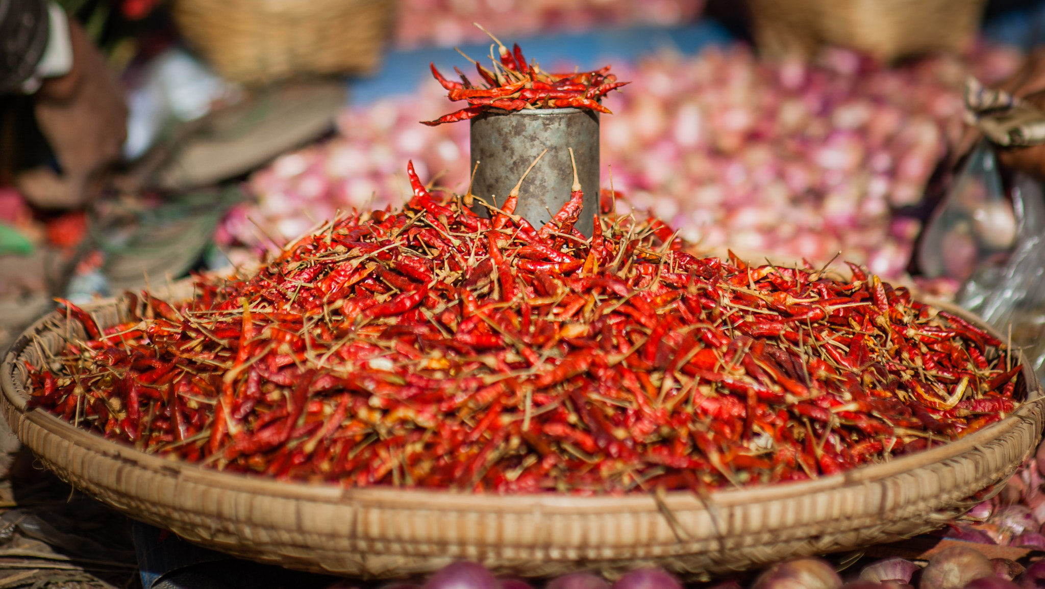 Nikon D700 + Sigma 85mm F1.4 EX DG HSM sample photo. Basket with red chillies at market in myanmar photography