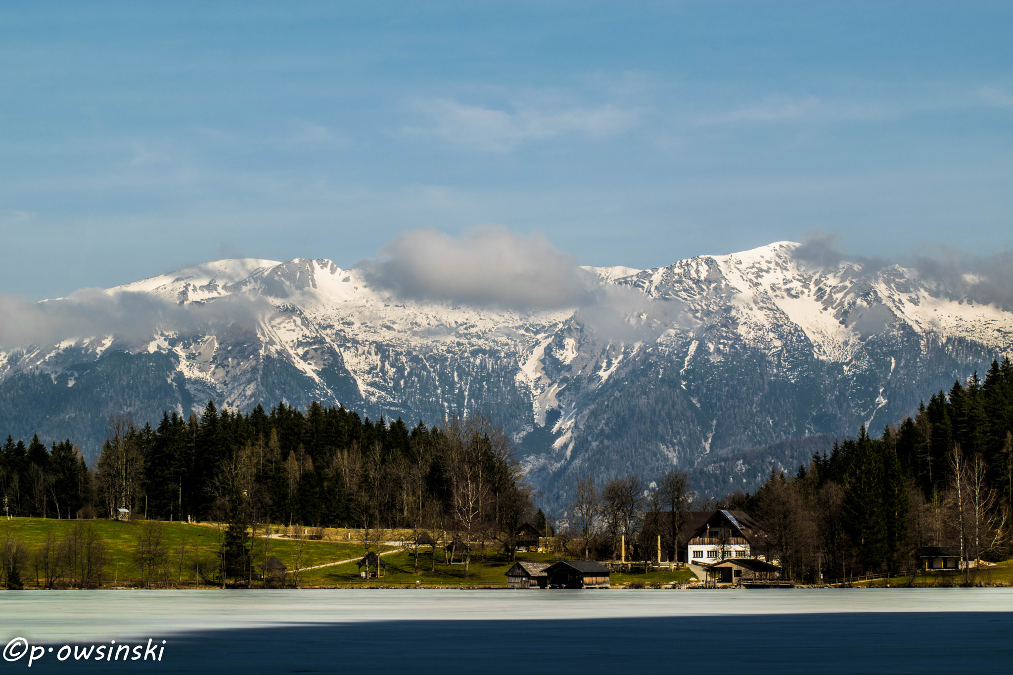 Nikon D5300 + Sigma 50-150mm F2.8 EX APO DC HSM II + 1.4x sample photo. Clouds over alps mountains photography