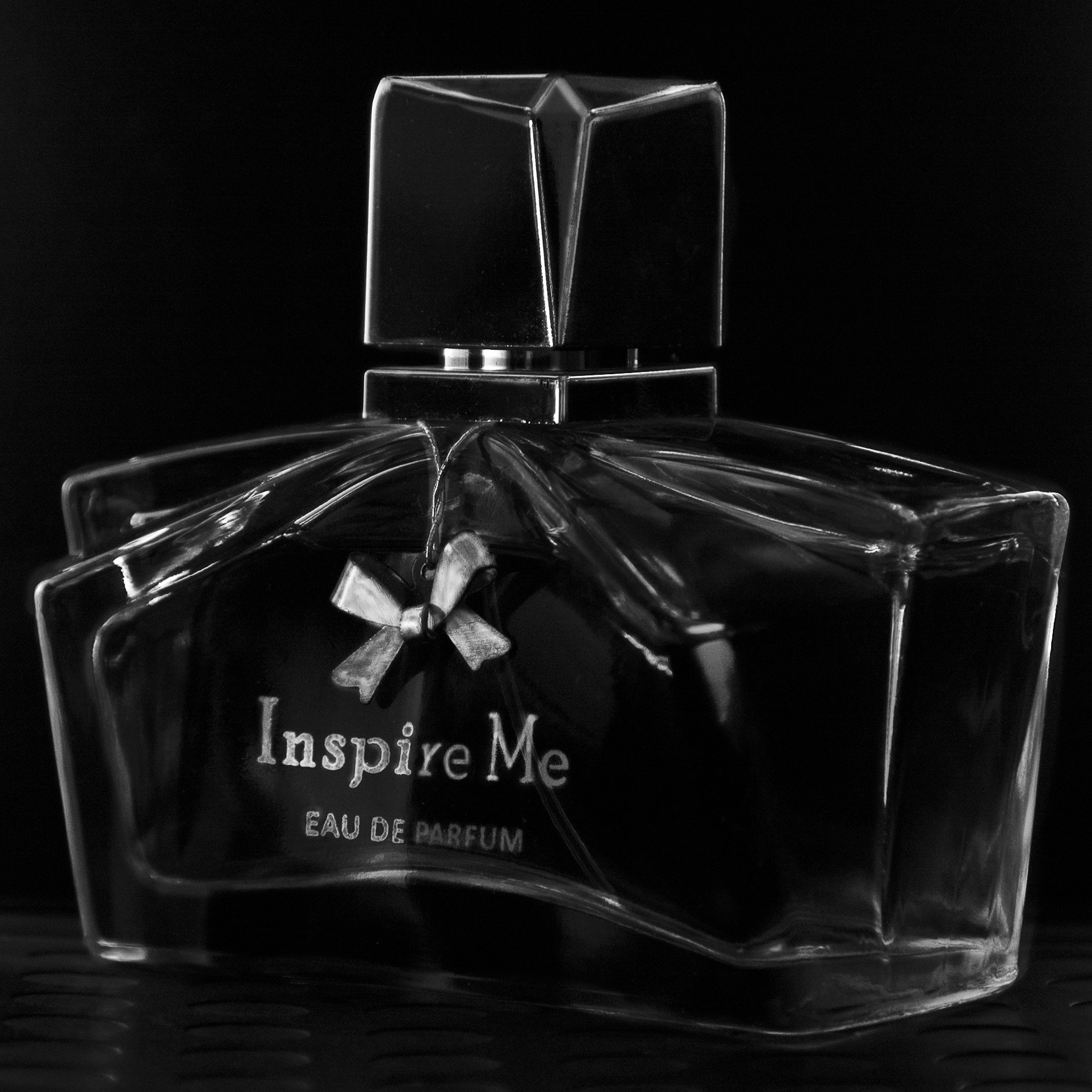 Nikon D40 sample photo. Eau de parfum bottle photography