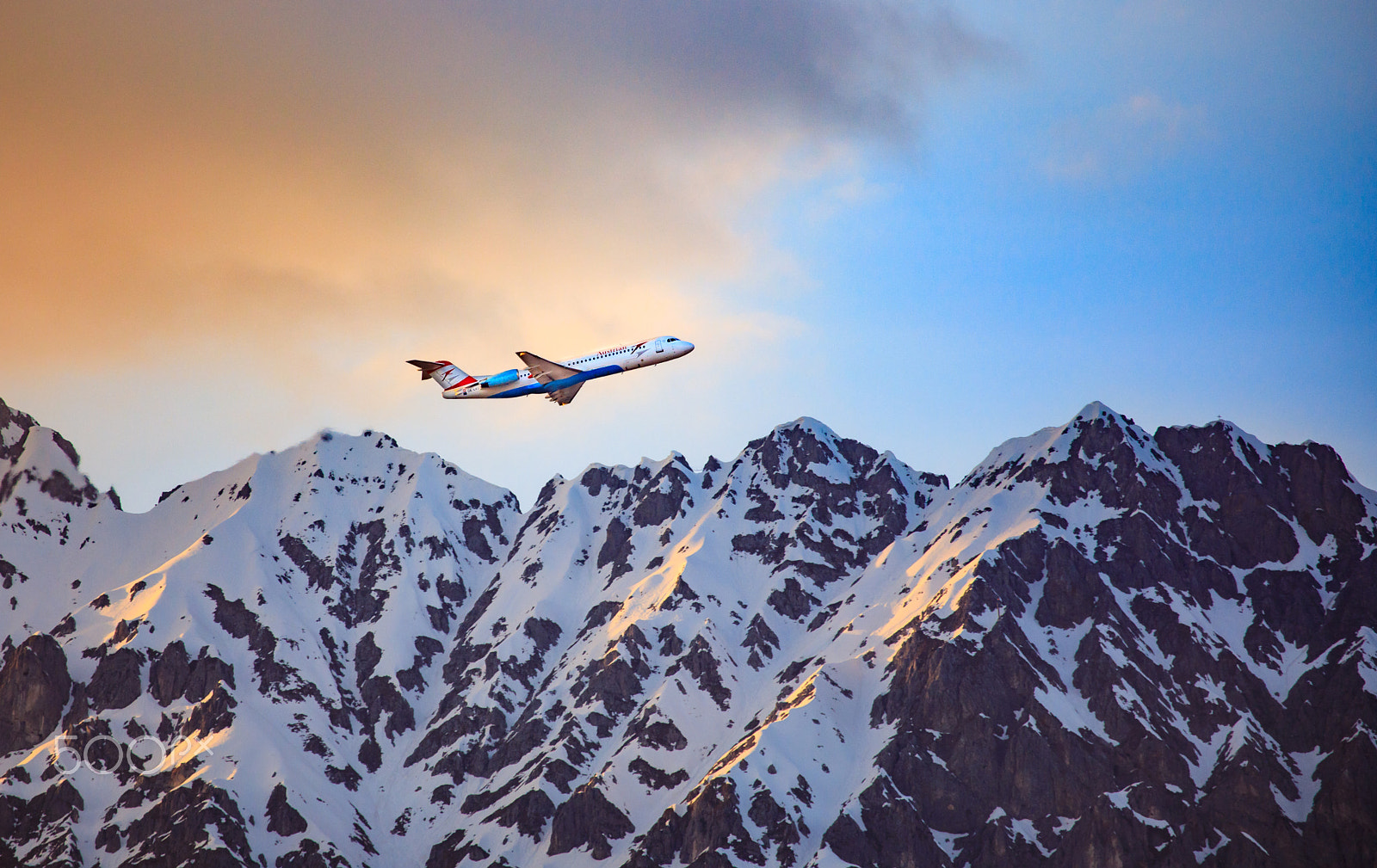 Canon EF 100-400mm F4.5-5.6L IS USM sample photo. Plane over the alps photography