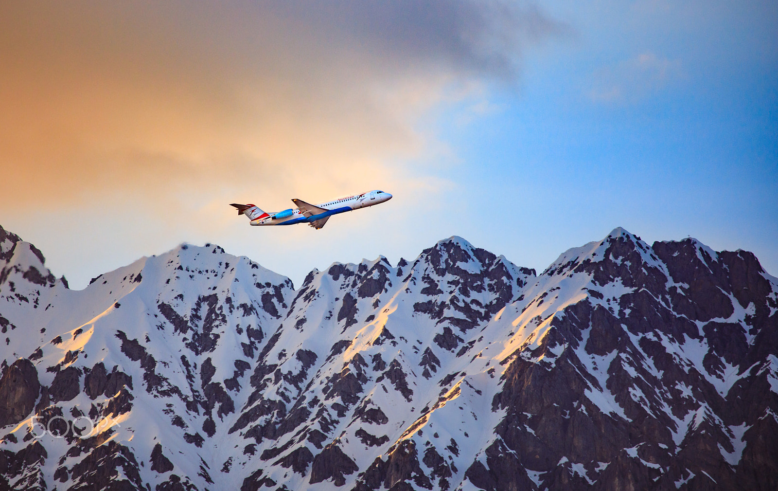 Canon EOS 5D Mark IV + Canon EF 100-400mm F4.5-5.6L IS USM sample photo. Plane over the alps photography