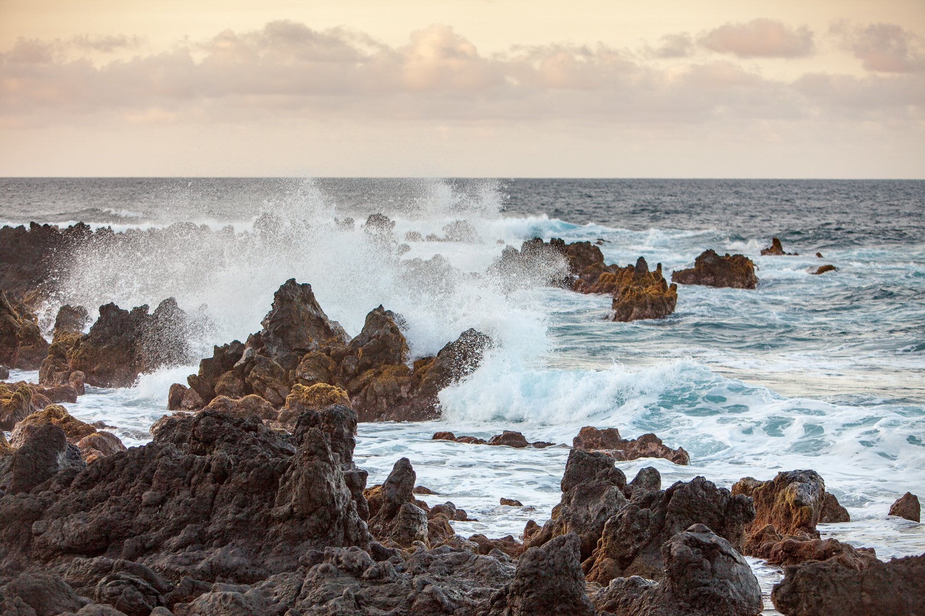 Canon EOS 5D Mark II + Canon EF 70-200mm F2.8L IS USM sample photo. Waves crashing against lava rocks photography