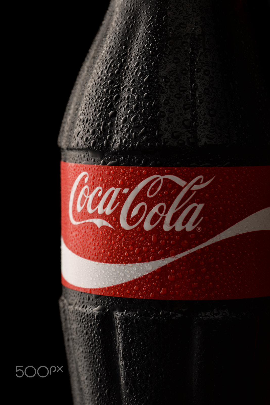Nikon D610 sample photo. Close up of coca-cola classic bottle with drops photography