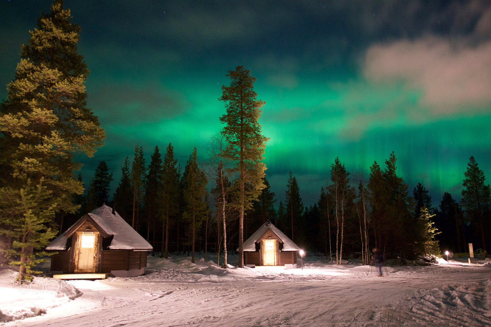 Sony Alpha a5000 (ILCE 5000) sample photo. Aurora cabins under clouds photography