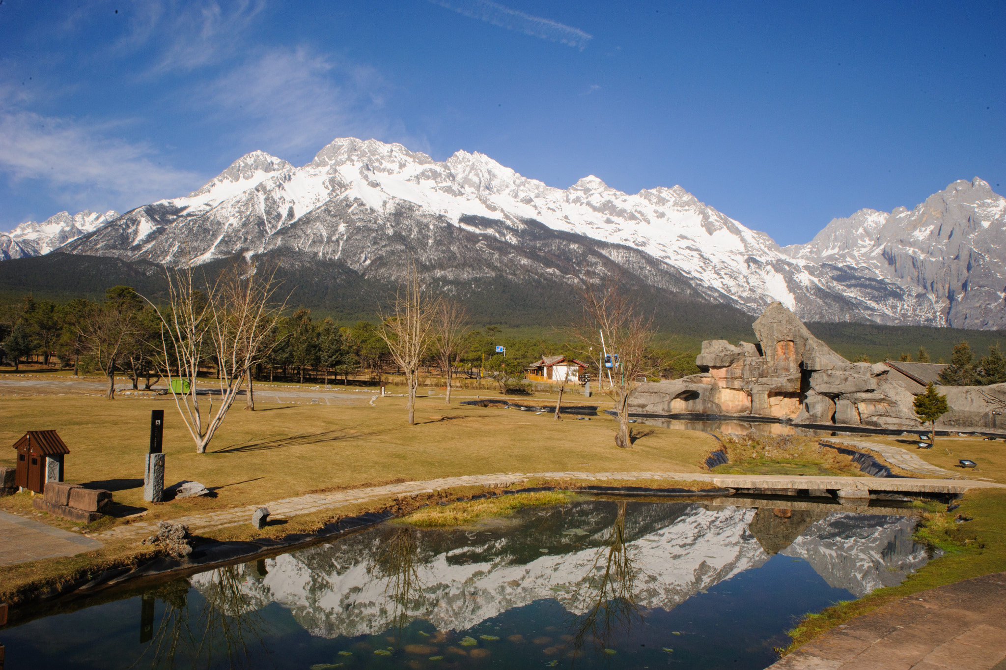 Nikon D700 sample photo. Jade dragon snow mountain in the pond photography