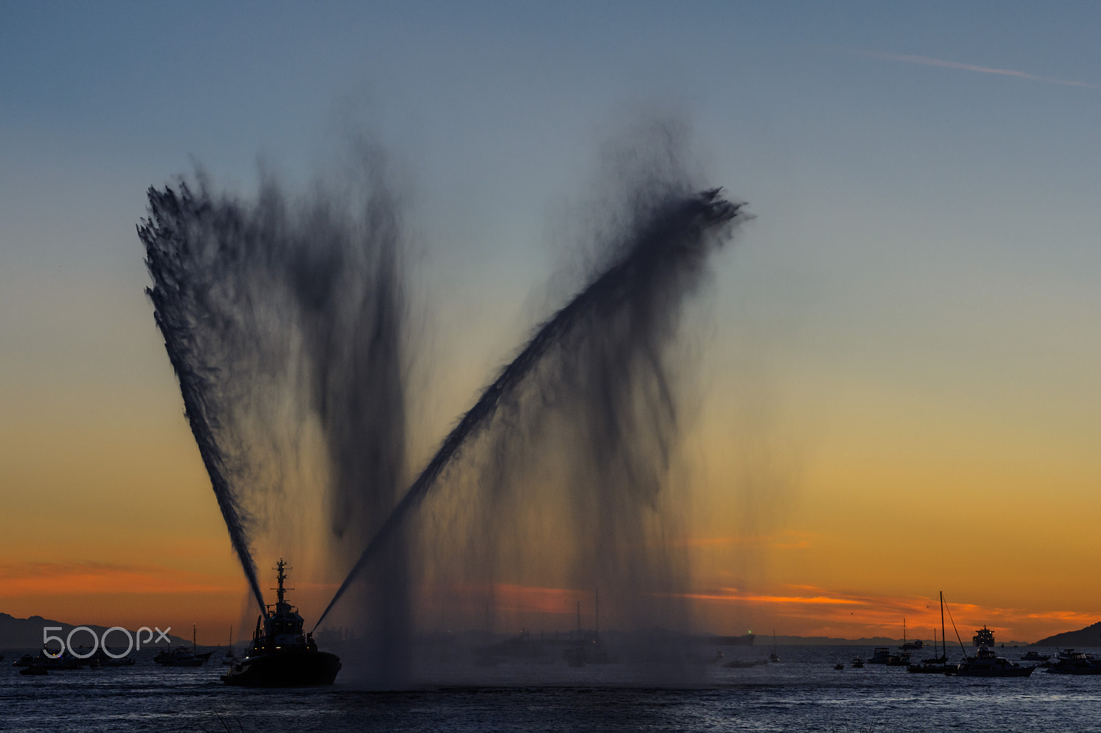 Nikon AF-S Nikkor 24-120mm F4G ED VR sample photo. Sprays water as firefighter boat photography