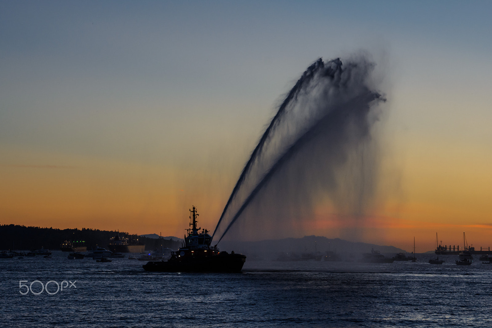 Nikon AF-S Nikkor 24-120mm F4G ED VR sample photo. Sprays water as firefighter boat photography