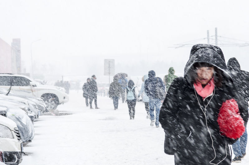 ZEISS Makro-Planar T* 100mm F2 sample photo. A heavy snowstorm attacked the city.people had to  ... photography