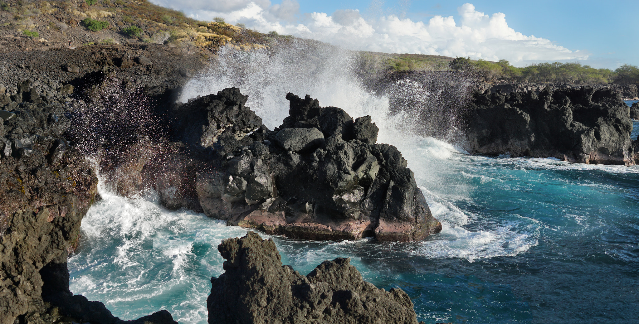 Sony ILCA-77M2 sample photo. Giant splash - find the person to see scale photography