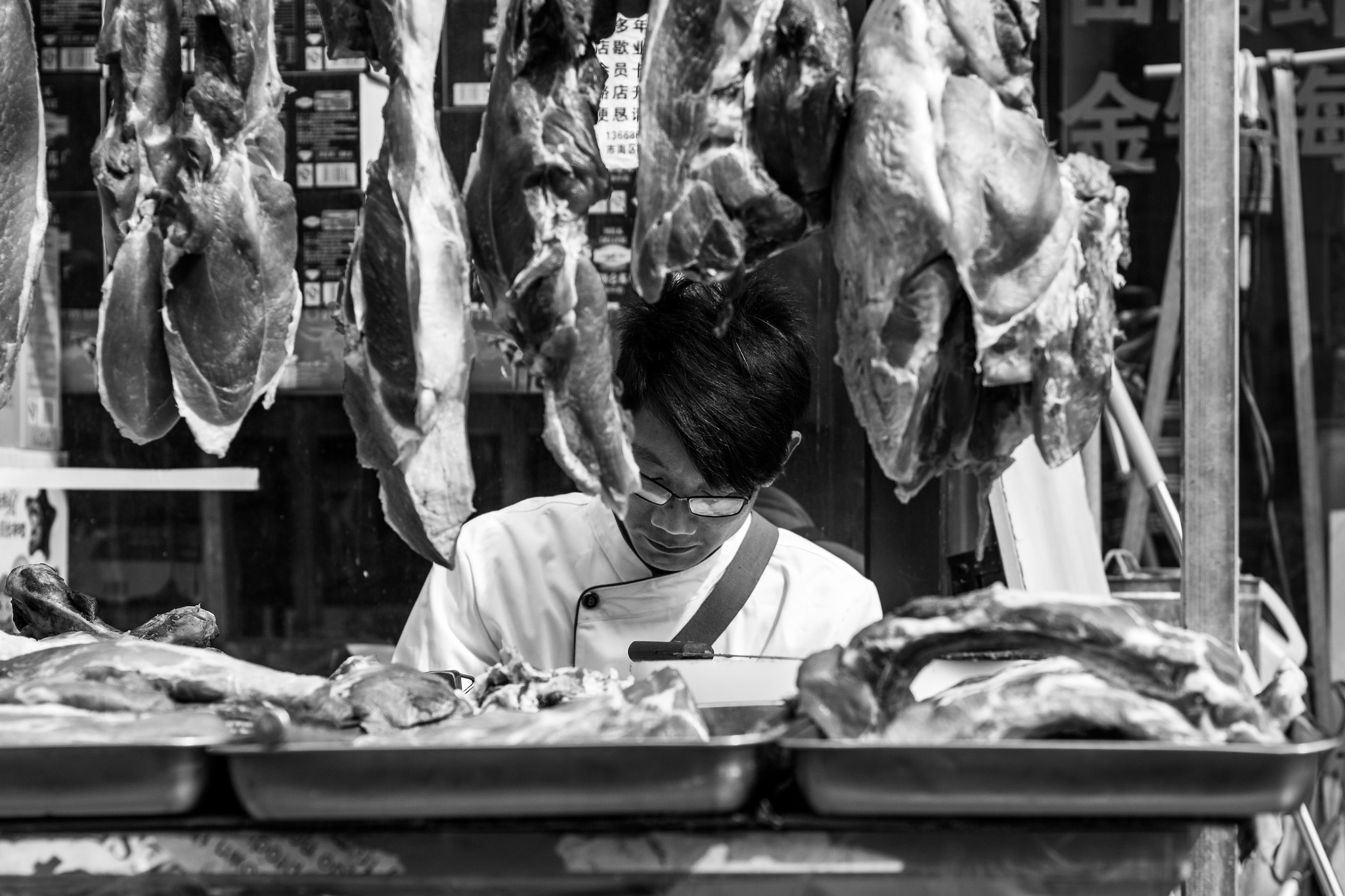 Canon EOS 100D (EOS Rebel SL1 / EOS Kiss X7) + Canon EF 50mm F1.4 USM sample photo. The butcher photography