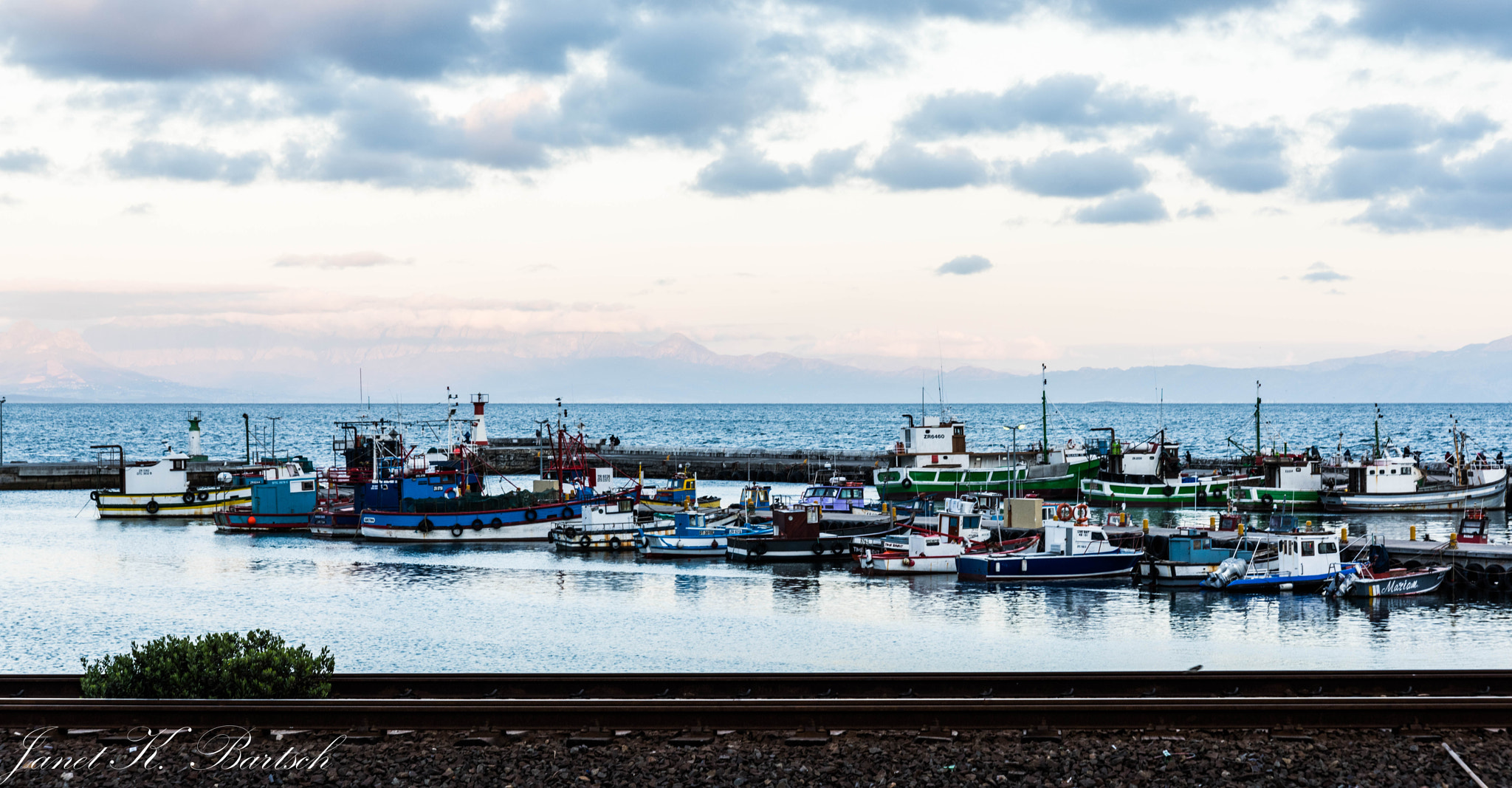 Nikon AF Nikkor 24-85mm F2.8-4D IF sample photo. End of the day for the boats of kalk bay photography