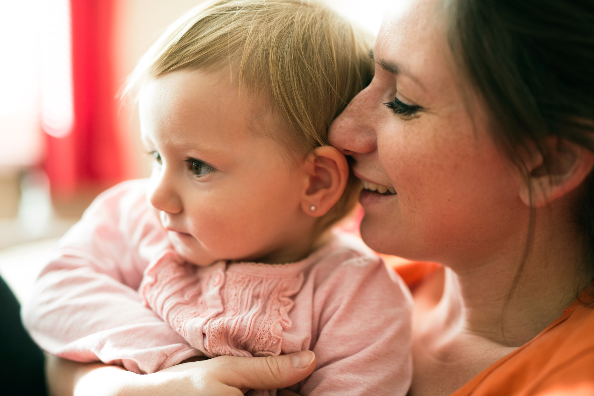 Nikon D800 + Sigma 50mm F1.4 DG HSM Art sample photo. Close up of mother holding her cute baby daughter photography