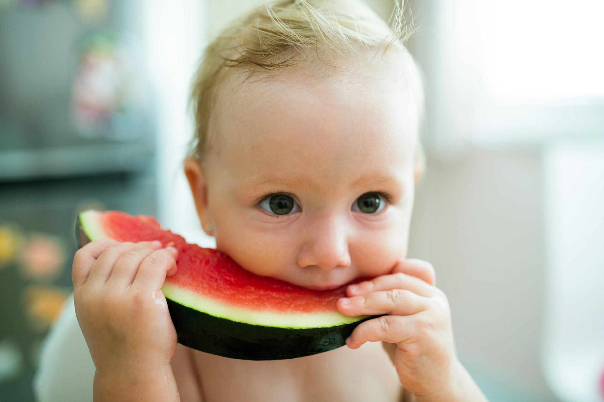 Nikon D4S sample photo. Cute little girl sitting in high chair eating watermelon photography