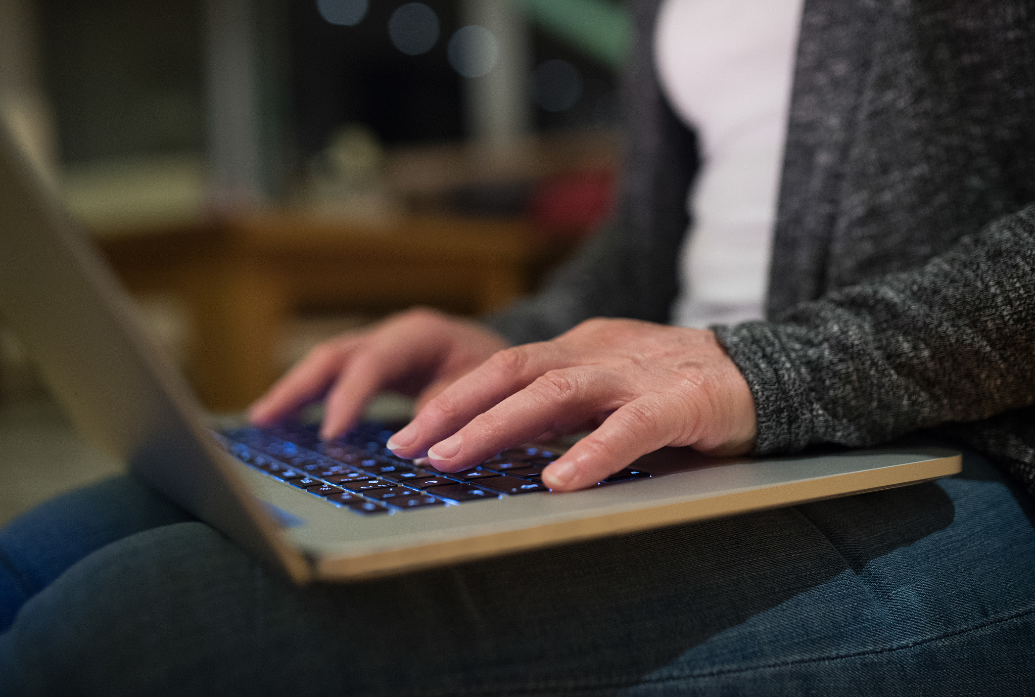 Nikon D4S + Sigma 35mm F1.4 DG HSM Art sample photo. Hands of unrecognizable woman working on laptop photography