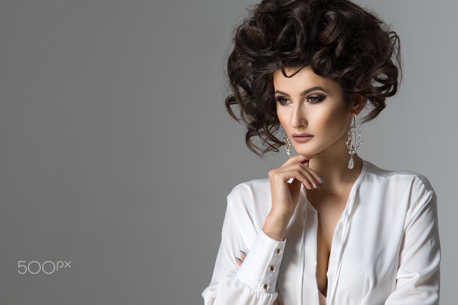 Nikon AF-S Micro-Nikkor 105mm F2.8G IF-ED VR sample photo. Sensual beautiful brunette woman posing in white shirt and earrings. girl with long curly hair. photography