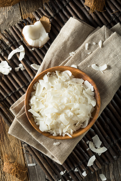 Canon EF 100mm F2.8L Macro IS USM sample photo. Raw organic coconut flakes photography