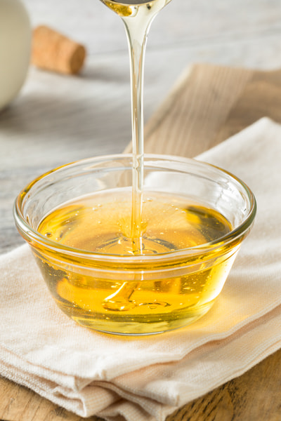 Canon EF 100mm F2.8L Macro IS USM sample photo. Raw organic sweet light agave syrup photography