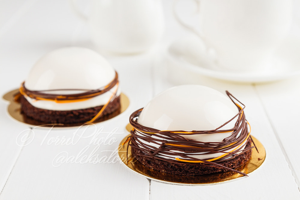 Canon EOS 650D (EOS Rebel T4i / EOS Kiss X6i) sample photo. White mousse dessert with mirror glaze photography