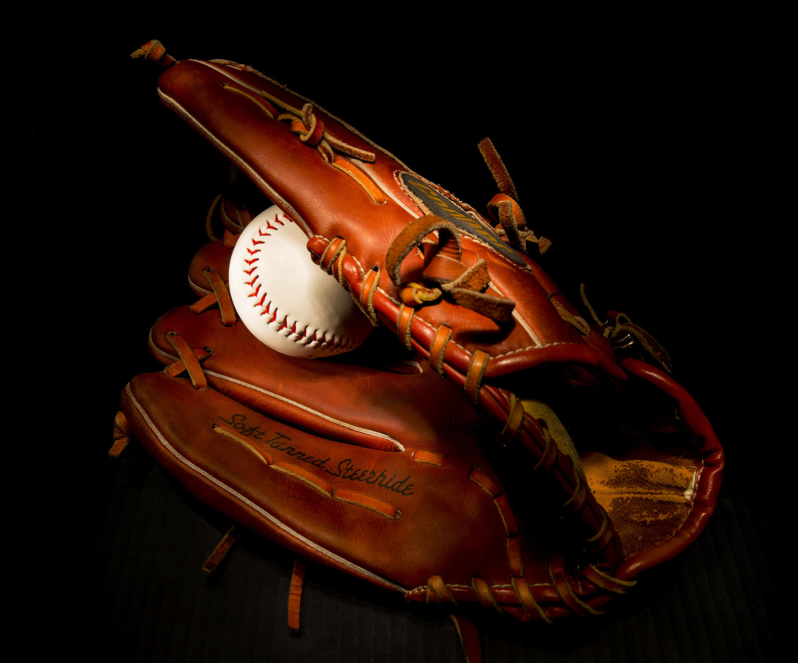 Nikon D4 + Nikon AF-S Nikkor 28-70mm F2.8 ED-IF sample photo. Glove and ball photography