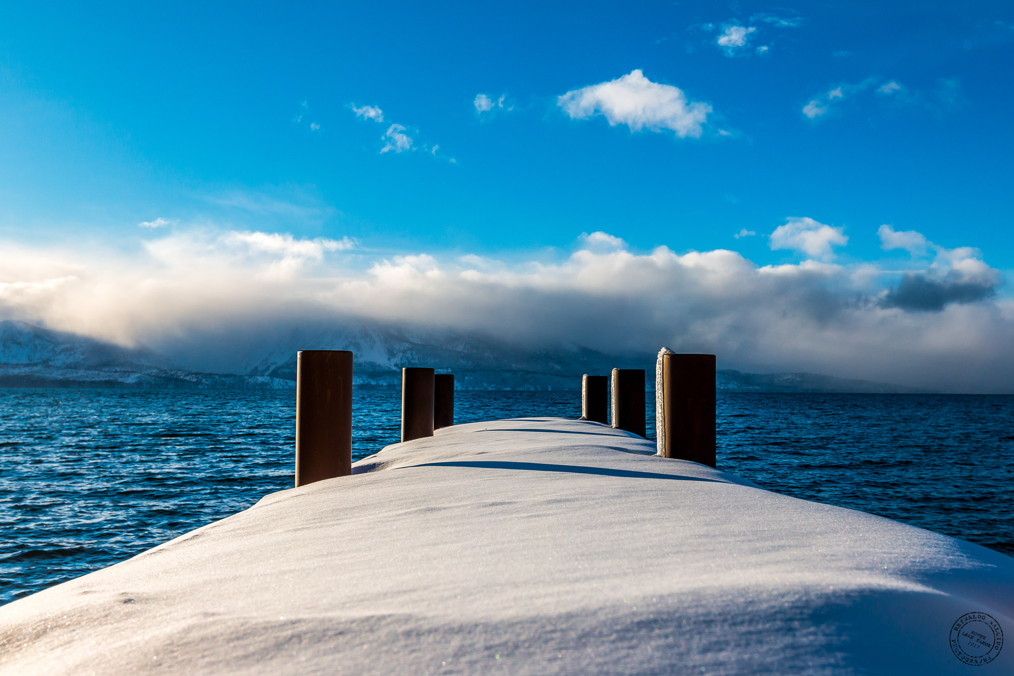 Canon EOS 70D + Canon EF 16-35mm F4L IS USM sample photo. Snowy pier photography