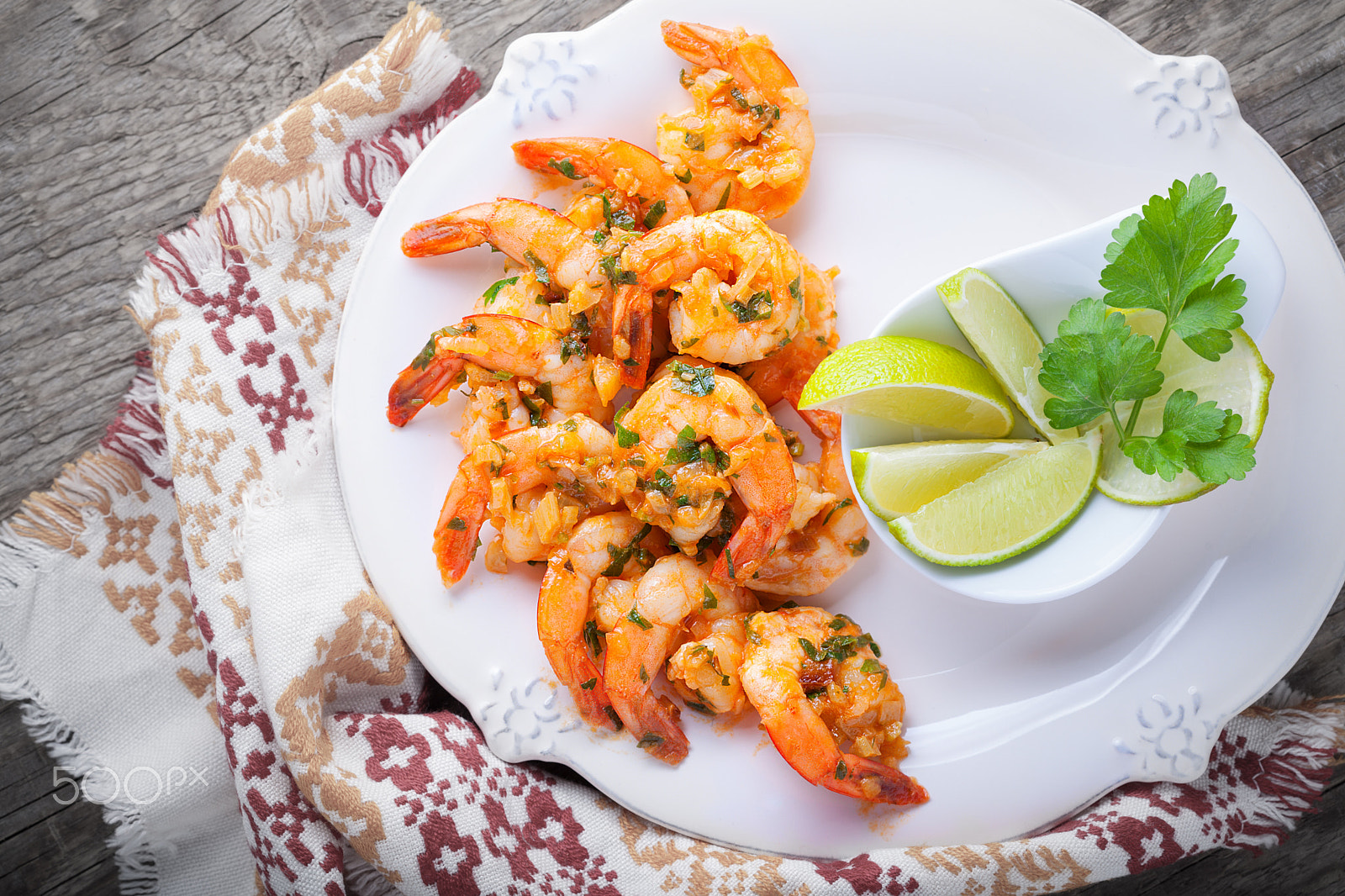 Canon EOS 5D Mark II sample photo. Fried prawns with lemon served on a wooden surface. photography