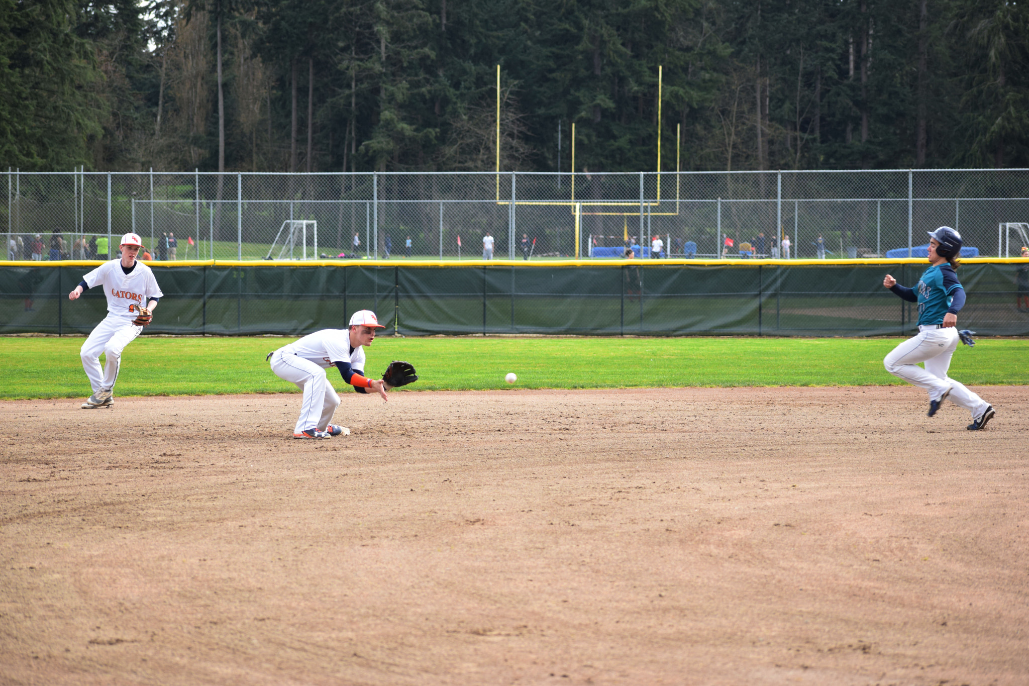 Nikon AF-S Nikkor 70-200mm F2.8G ED VR II sample photo. When your injured and can't play ball might as well take pictures. photography