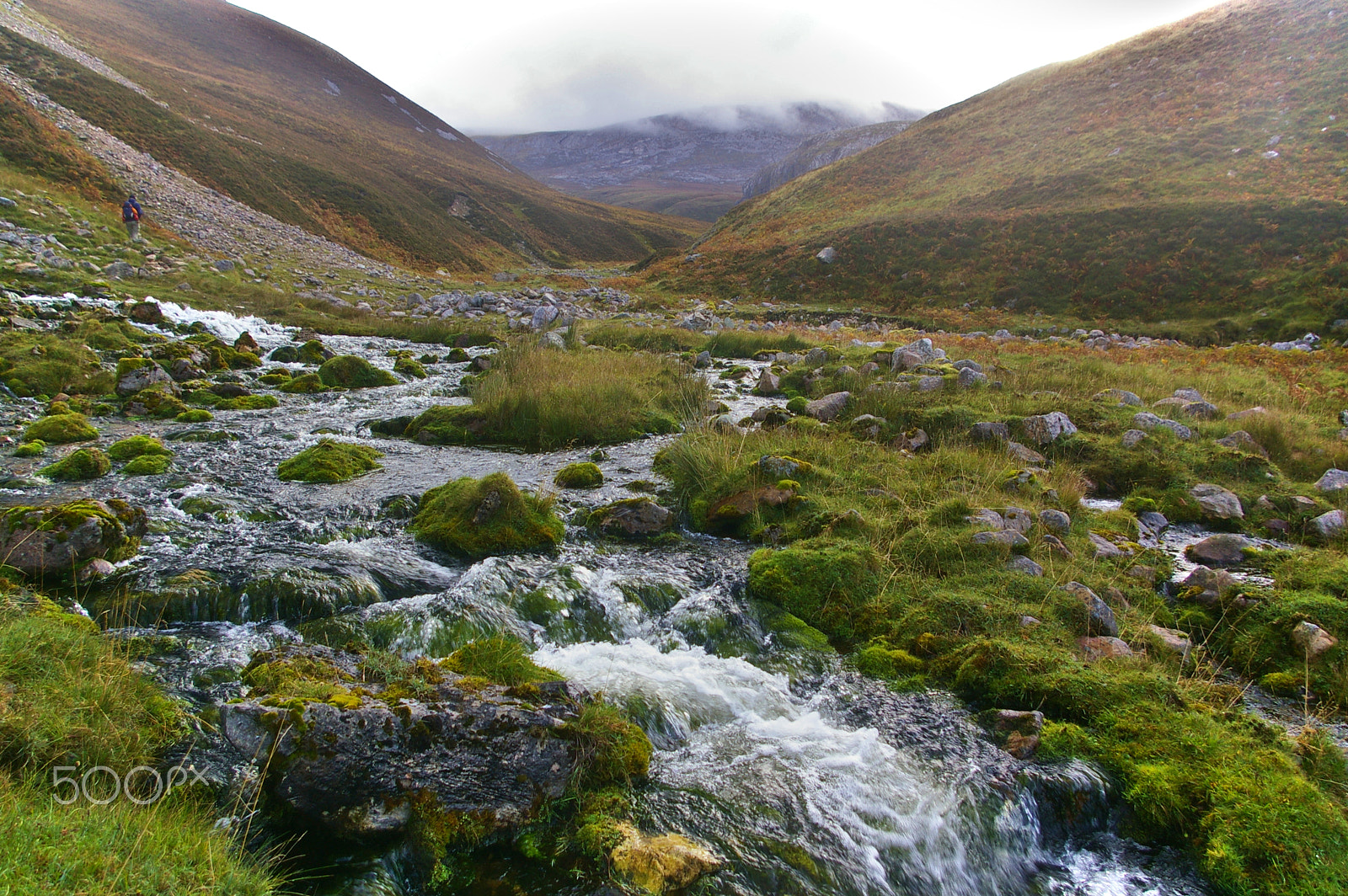 Pentax K100D + Pentax smc DA 18-55mm F3.5-5.6 AL sample photo. Rocky stream running through a valley photography