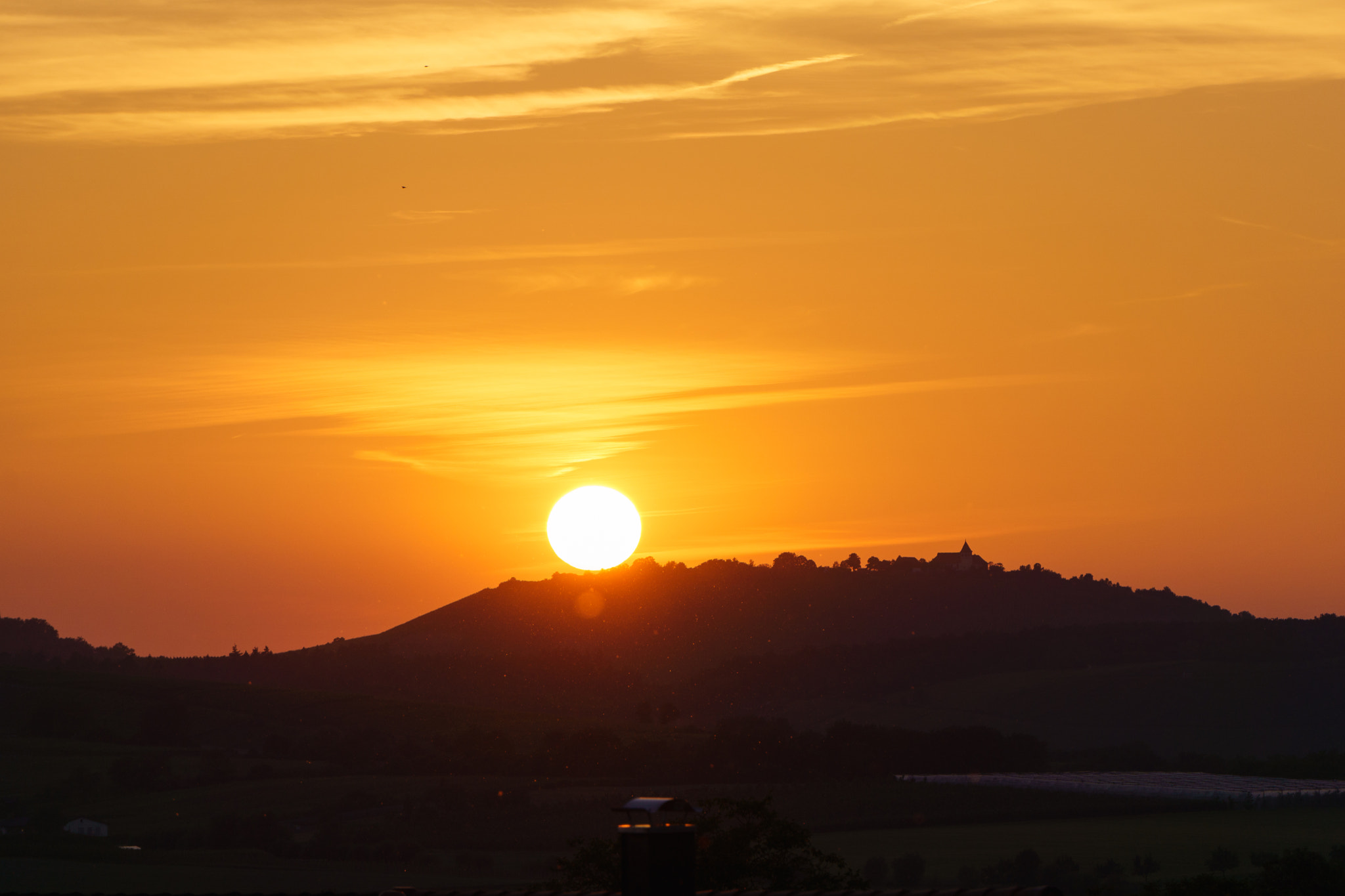 Sony E 55-210mm F4.5-6.3 OSS sample photo. Sunset over michealsberg, tripsdrill. germany. photography
