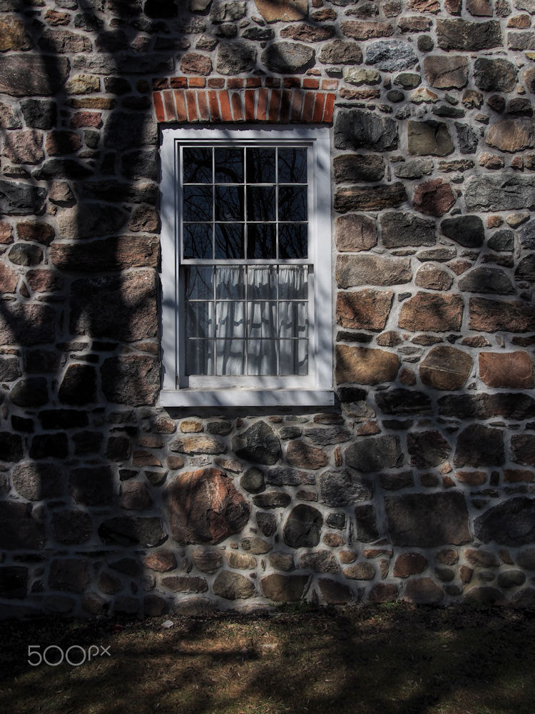 Olympus OM-D E-M5 sample photo. Window, stone, shadows photography