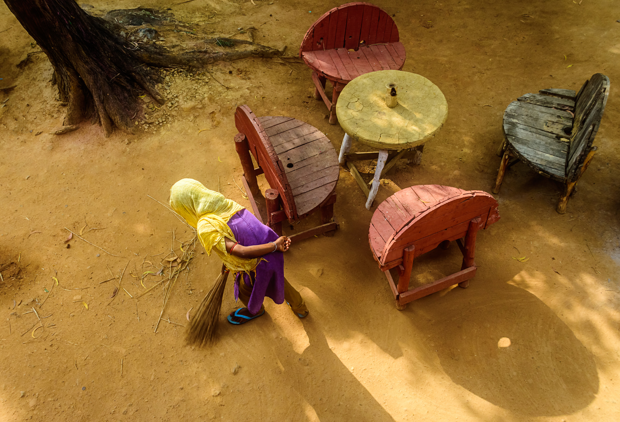 Nikon D7200 sample photo. Young lady sweeping in the early morning light with copy space photography
