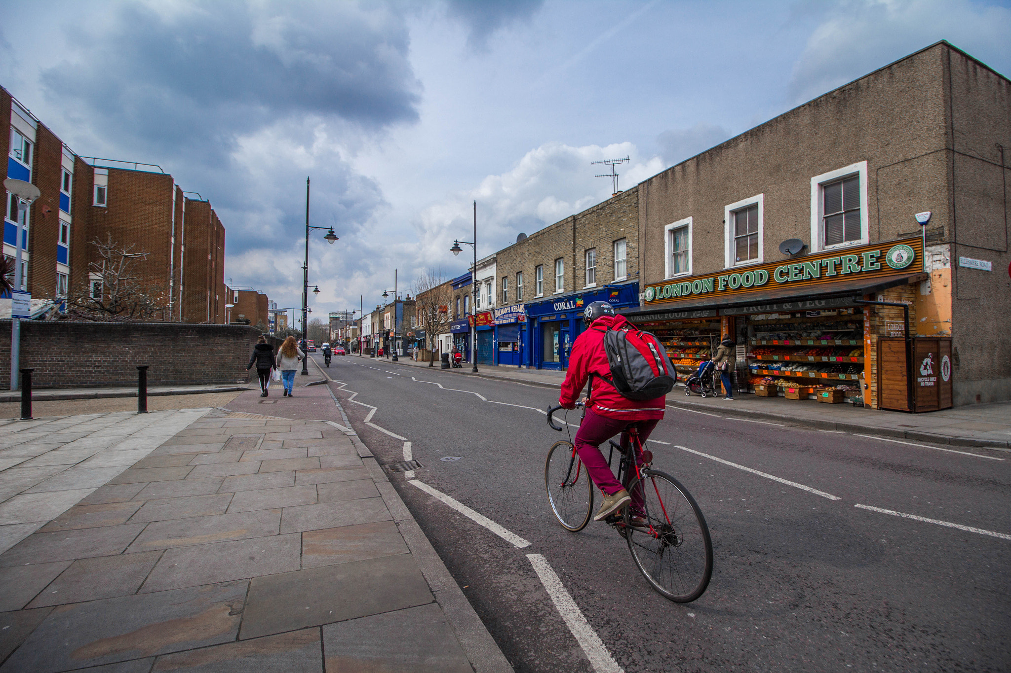 Canon EOS 60D sample photo. Cyclist on the road photography
